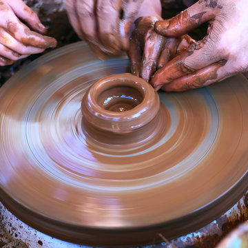 Hands Working On Pottery Wheel