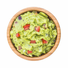 Guacamole in Wooden Bowl Isolated on White Background © kaycco