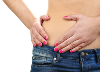 Fototapeta premium Abdominal pain in young girls close up