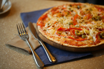 Delicious pizza on table close up