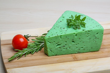 Green pesto cheese and basil leaves