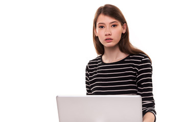 Naklejka premium Young Cute Woman with PC On Floor E-commerce Stock Image