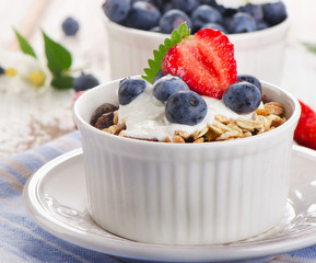 Muesli and yogurt with  blueberries