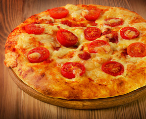 Homemade Italian pizza with tomatoes