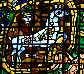man with horse stained glass
