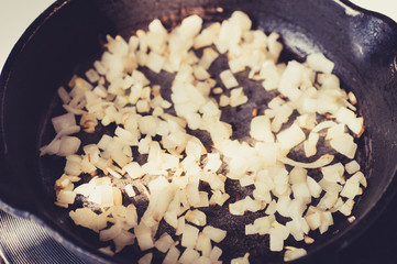 Chopped onion fried in a pan