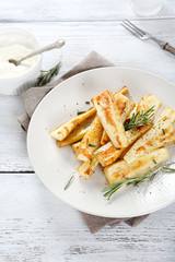 oven-baked parsnips piece on plate