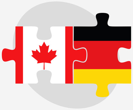 Canada and Germany Flags in puzzle