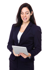 Brunette Businesswoman use of digital tablet