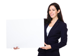 Caucasian businesswoman show with white board