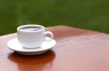 Hot cup on table