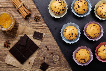 muffins with chocolate on a stone tray