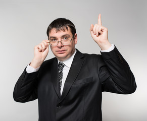 businessman wearing glasses, an idea