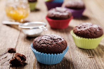 muffins with chocolate in colorful molds
