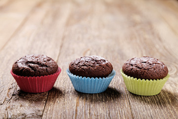 muffins with chocolate in colorful molds