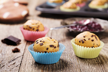 muffins with chocolate in colorful molds