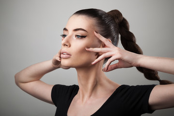 Obraz premium Portrait of beautiful woman with perfect skin and make-up