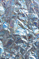 Crumpled color foil texture background