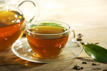 Cup of green tea on table close-up