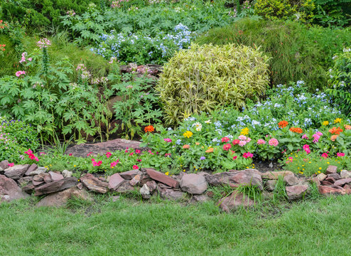Colorful flowerbed on a lawn