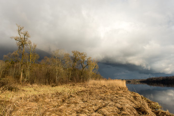 dramatic clouds over the river