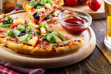 Pizza hawaii with beer