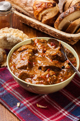Beef stew served with crusty bread
