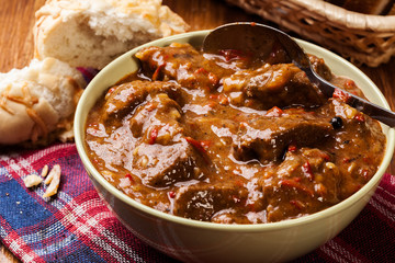 Beef stew served with crusty bread