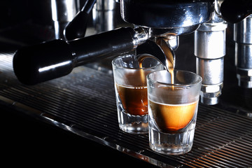 Professional espresso machine brewing a coffee - 82638063