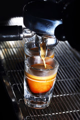 Espresso machine brewing a coffee