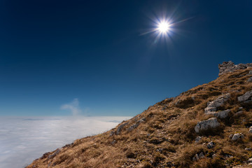 View from the mountain peak above the clouds