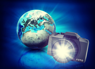 Earth and camera on abstract blue background