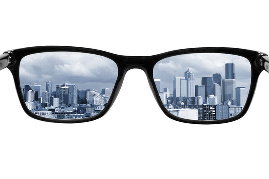 business city seen through the eyepieces