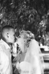 Bride and Groom at wedding Day walking Outdoors on spring nature