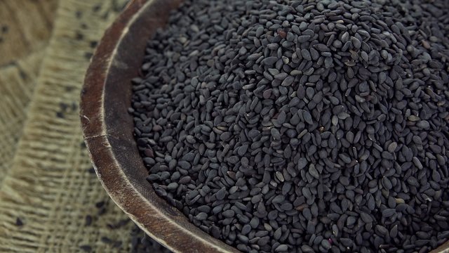 Portion of rotating Black Sesame (not loopable 4K UHD footage)