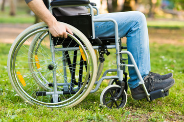 Detail of a man using a wheelchair