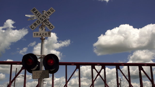 Train Passing Railroad Crossing Warning Lights Flashing