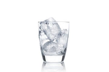 glass with ice cubes on white background