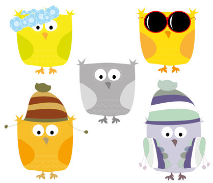 Set of isolated cartoon owls in all seasons / vectors