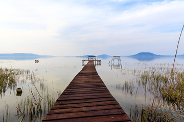 Wooden pier in tranquil lake Balaton