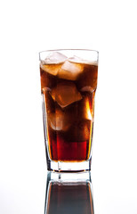soft drinks. Cola glass with ice cubes on a white background