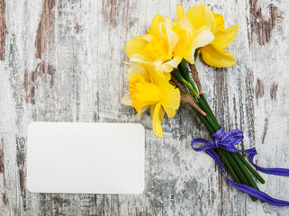 daffodil flowers on a wooden background