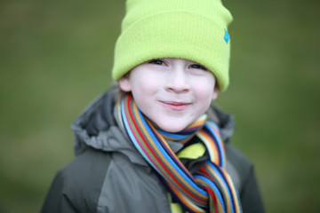 Cheerful warmly dressed boy portrait