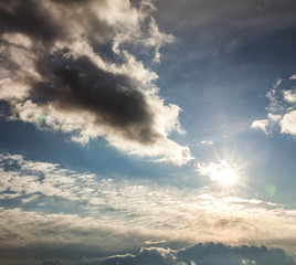 sky with clouds and sun