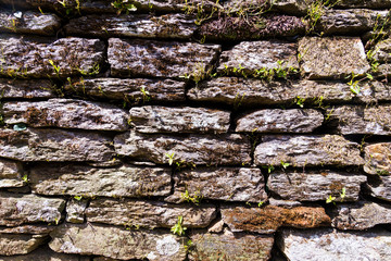 Abstract weathered stone brick wall background