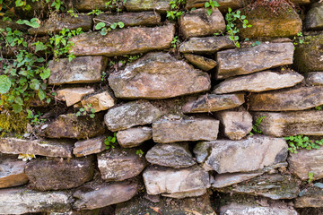 Abstract weathered stone brick wall background