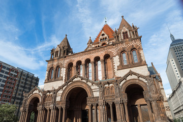 Fototapeta na wymiar Trinity Church in Boston surrounded by modern buildings