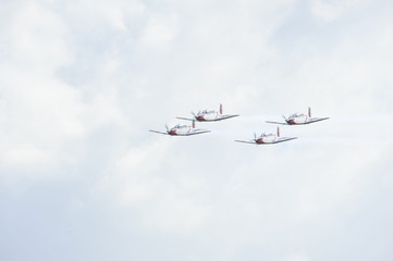 Synchronized flight of 4 planes in the team