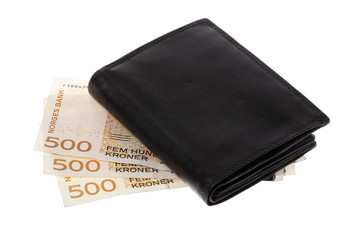Black wallet on top Norwegian currency