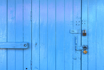 Closeup wooden blue door background